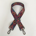Detail view of ethnic red canvas strap with colorful geometric patterns and metal hooks - Multicolor Geometric With Gunmetal Hook