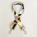 Detail of adjustable geometric woven shoulder strap in yellow patchwork with gold hooks - Yellow Patchwork (Gold Hook)