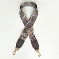 Detail of adjustable geometric woven shoulder strap with gold metal lobster clasps - Classic Coffee + Coffee Leather