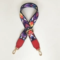 Detail of adjustable wide shoulder strap with colorful geometric pattern and gold hooks - Color Arrow + Red Leather