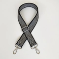 Detail of adjustable black and white herringbone shoulder strap with silver metal swivel hooks - Silver Arrow & Silver Hook