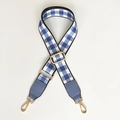 Detail of adjustable blue gingham check strap with light blue leather and gold hardware - Blue White Grid + Lake Blue Leather