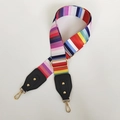 Detail of rainbow striped canvas bag strap with golden lobster clasps and black leather trim - Colorful Stripes With Black Leather and Gold Hook