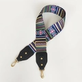 Close-up of ethnic geometric pattern canvas strap with gold metal lobster clasps - Ethnic Stripes With Black Leather and Gold Hook