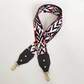 Detail view of ethnic red and black canvas strap with gold swivel lobster clasps - Rainbow With Black Leather and Gold Hook