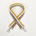 Close-up of a 3.8cm wide adjustable striped nylon shoulder strap with silver metal hooks - Yellow & White Stripe (Silver Hook)