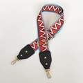 Detail of colorful geometric woven bag strap with golden hardware and leather ends - Triangle Grid With Black Leather and Gold Hook
