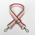 Close-up of a 3.8cm striped woven bag strap with adjustable metal buckles and hooks - Pink & Brown Stripe (Gunmetal Hook)