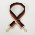 Detail view of adjustable 3.8cm wide striped nylon bag strap with gold metal spring hooks - Black & Brown Stripe (Gold Hook)