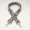 Detail view of the 3.8cm wide black and white leopard print fabric strap with gold hardware - Length approx. 130cm / Leopard Style 4 + Gold Hook