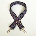 Close-up of pink and blue geometric pattern on wide woven bag strap with gold hooks - A16 Pattern (Gold Hook)