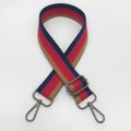 Close-up of adjustable striped handbag strap with navy blue and red webbing and gunmetal hooks - Red & Blue Stripe (Gunmetal Hook)