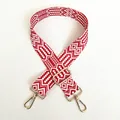 Detail view of ethnic red and white geometric woven strap with golden metal swivel hooks - A18 Pattern (Gold Hook)