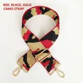 Dettaglio tracolla jacquard mimetica rosso e nero con ganci in metallo dorato regolabili - Rosso e Filo d'Oro
