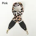 Close-up of pink leopard print wide strap with black lychee leather and gold hardware - Pink (Gold Clasp)