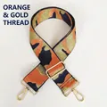 Detail of adjustable camouflage jacquard bag strap with orange and gold threads - Orange & Gold Thread