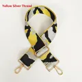 Detail of wide jacquard replacement strap with yellow, black, and silver woven pattern - Yellow & Silver Thread