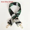 Detail view of green camo jacquard woven strap with metallic silver thread and gold hooks - Green & Silver Thread
