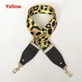 Detail of yellow leopard print crossbody strap with gold metal buckle and leather ends - Yellow (Gold Clasp)