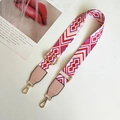 Detail of colorful geometric woven strap with gold metal hooks and pink faux leather ends - Pink with Pink Trim