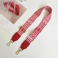 Detail of red and white ethnic woven bag strap with golden lobster clasps and buckles - Red White and Red Leather Accent