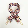 Close-up of geometric pattern canvas purse strap with gold metal lobster clasps - Radiant Pattern (Gold Hook)