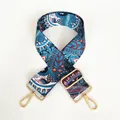 Detail of bohemian canvas purse strap with ethnic patterns and gold metal lobster clasps - Phoenix Tail (Gold Hook)