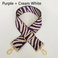 Detail of purple and cream zebra pattern woven bag strap with golden metal snap hooks - Purple + Cream + Gold Hook