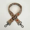 Close-up of adjustable woven bag strap with diamond embroidery and gunmetal buckles - Orange Brown Vintage Argyle Style (A42+Gunmetal Hook)