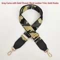 Detail of adjustable camouflage bag strap with grey gold thread and black leather - Grey Gold Camouflage