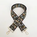 Detail of floral embroidery on wide green shoulder strap with gold metal lobster clasp - A55 Dark Green Embroidery (Gold Hook)
