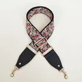 Detail view of ethnic floral embroidered wide bag strap with gold hooks and black leather tips - A57 Bohemian Colorful Embroidery (Black Leather & Gold Hook)