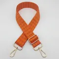 Detail of adjustable wide bag strap with orange and brown houndstooth jacquard pattern - Silver Hook / Orange and Brown-Silver Hook (3)