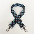 Detail of adjustable wide shoulder strap with blue and orange geometric pattern and metal hooks - Blue Black Orange Geometric Check (A60) + Gunmetal Hook
