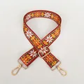 Close-up of ethnic floral embroidery on adjustable strap with gold lobster clasps - Red-Brown Daisy A70 (Gold Hook)
