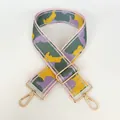 Close-up of wide nylon replacement strap with colorful geometric weave and gold metal hooks - Yellow Purple Gray Jacquard (No. 6 + Gold Hook)