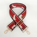 Detail view of wide nylon bag strap with red geometric pattern and gold metal hardware - Red Brown Beige Camo (No. 11 + Gold Hook)