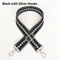 Dettaglio di tracolla regolabile in nylon nero con ganci girevoli in metallo argento - Nero + Gancio d'Argento