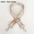 Detail of khaki nylon wide strap with white V-pattern and silver metal hooks - Khaki + Silver Hook