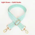 Detail of light green herringbone cotton bag strap with polished gold metal swivel hooks - Light Green + Gold Hook