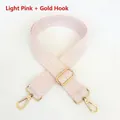 Detail of light pink and white herringbone pattern woven bag strap with gold metal hooks - Light Pink + Gold Hook