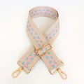 Detail view of adjustable wide woven shoulder strap with pink and blue geometric pattern - Style No. 8 (Gold Hook)
