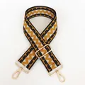 Detail view of ethnic style wide woven bag strap with geometric patterns and gold buckles - Style No. 14 (Gold Hook)