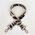 Detail of Style 4 wide adjustable zebra pattern bag strap with gunmetal swivel hooks - No.4 + Gunmetal Hook