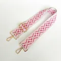 Detail of adjustable pink and white geometric rhombus woven canvas bag strap with gold hooks - Size 26