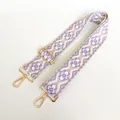 Close-up of geometric purple and white jacquard canvas strap with golden metal buckle - Style 29