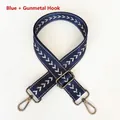 Detail of adjustable blue nylon bag strap with white chevron patterns and gunmetal hardware - Blue + Gunmetal Hook