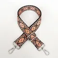 Detail of adjustable orange and black geometric pattern canvas shoulder strap with silver clasps - Leopard Style 2 with Silver Hook