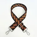 Detail view of coffee-colored checkered bag strap with silver metal swivel hooks - Coffee + Silver Hook