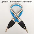 Detail of adjustable canvas bag strap with light blue stripes and gold swivel hooks - Light Blue with Black Leather and Gold Hook